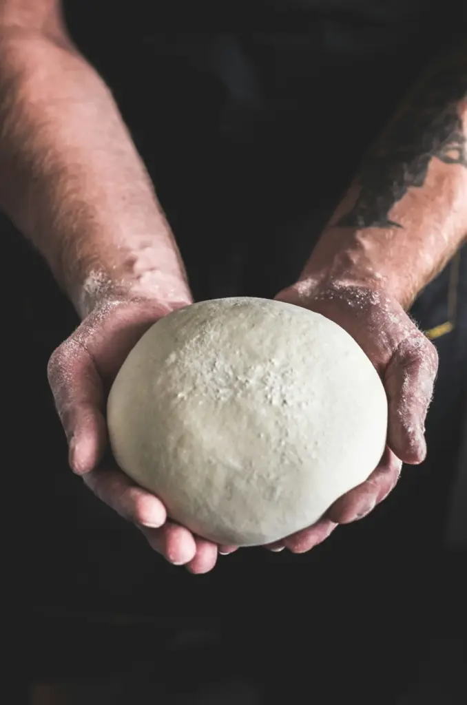 Pizza: A Journey from Ancient Flatbreads to Scarletta’s Gourmet